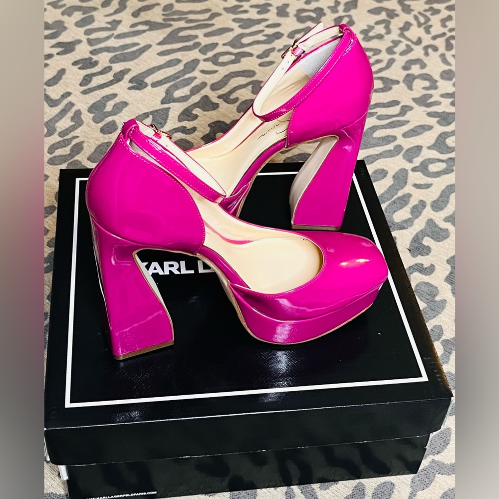 Sassy, fuchsia, ankle strapped, platform shoes.